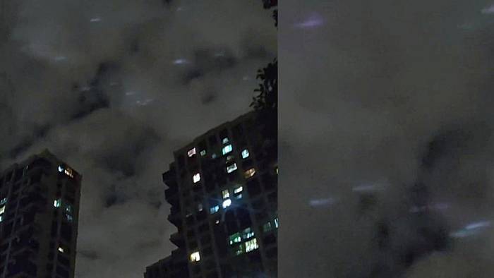 Rätselhafte Lichter über Stadt in China